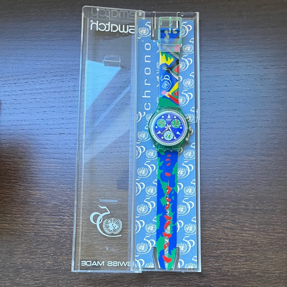 In original case. new & never used Swatch Chrono UN 50th anniversary Watch